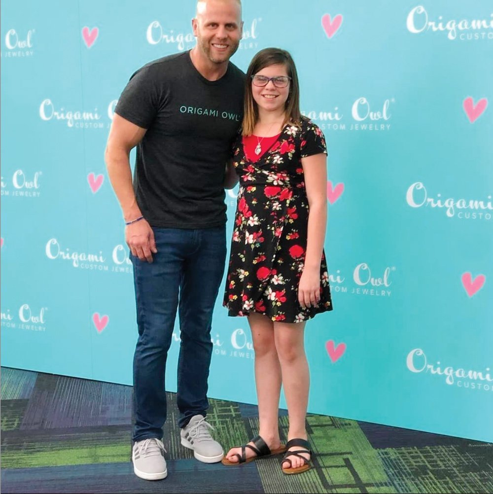 Origami Owl step and repeat social media background with Tyson Basha